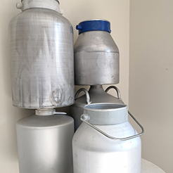 Aluminum milk cans necking spinning process