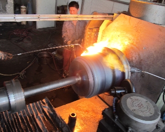 Hot metal spinning process