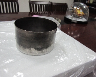 Titanium alloy hot spinning process